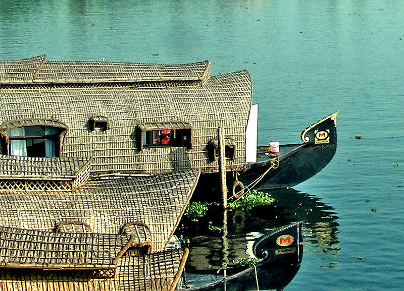 Two houseboats moored together on the backwaters, Alleppey — bamboo and cane hull detail