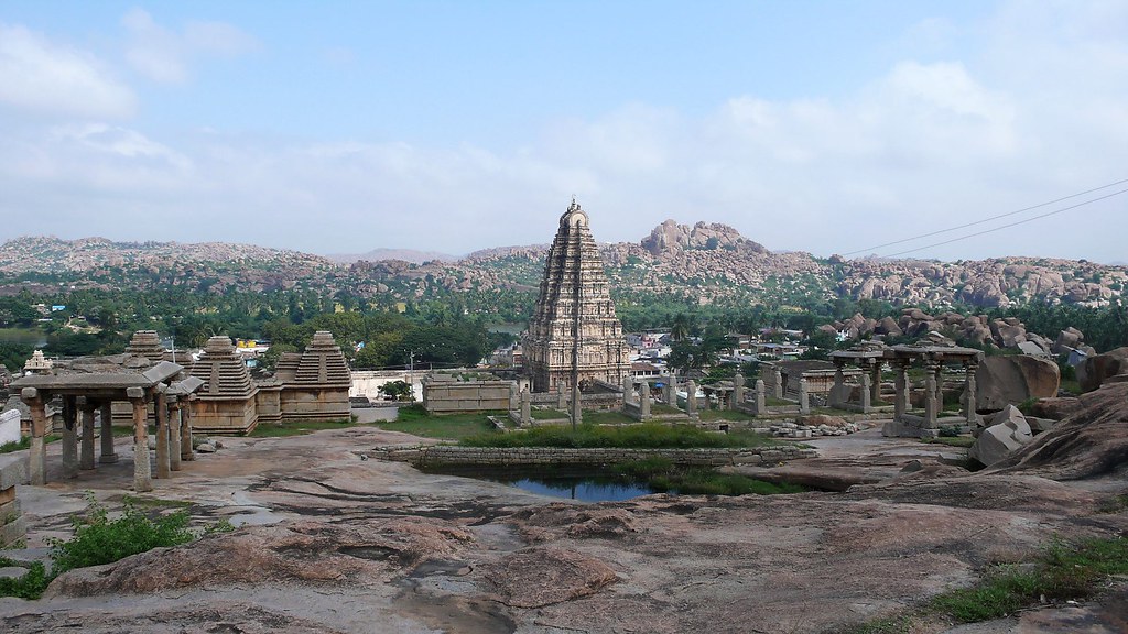 Hampi panorama — Virupaksha Temple rising above the boulder-strewn landscape
