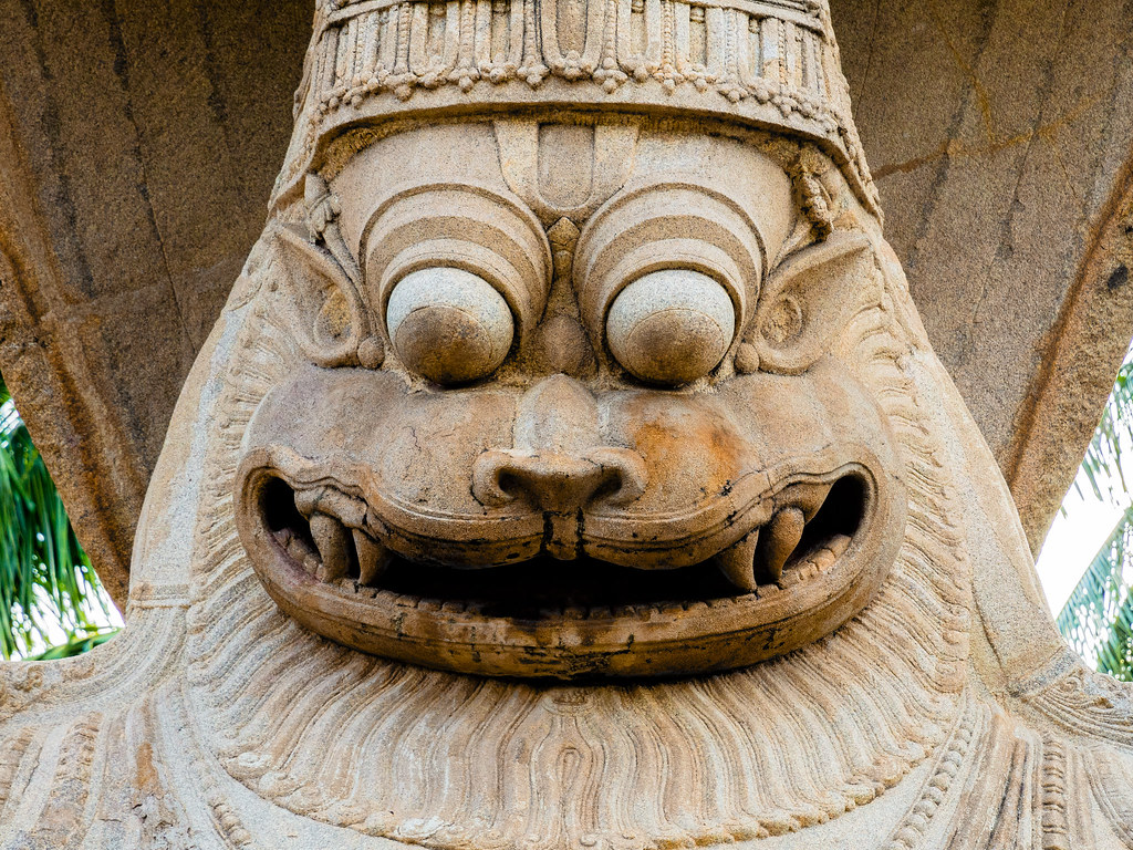 Close-up of the Ugra Narasimha monolithic statue — lion-headed Vishnu avatar, Hampi