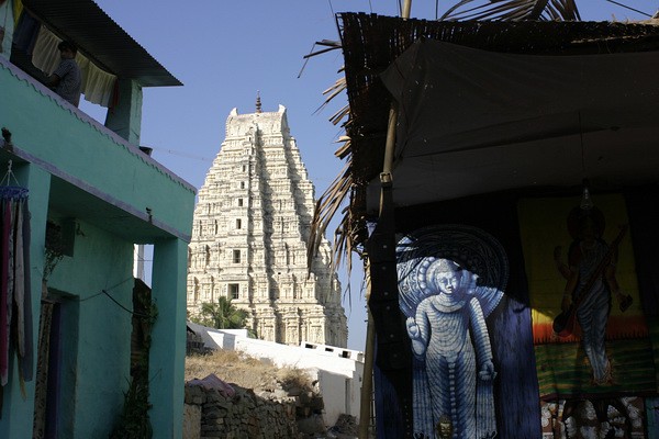 Virupaksha Temple gopuram rising above the Hampi bazaar lane