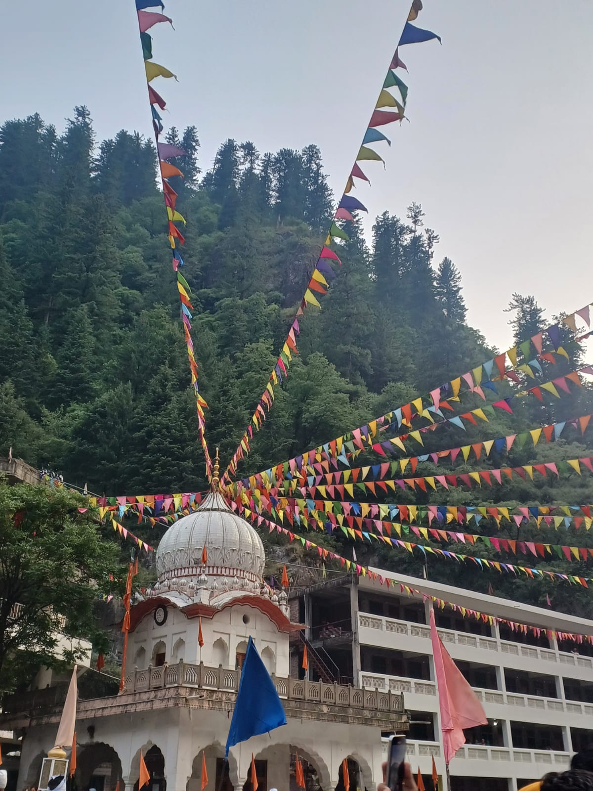 Manikaran Sahib Gurudwara draped in colourful festival flags, Parvati Valley