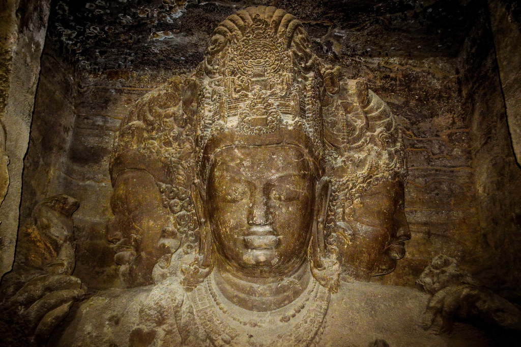 Trimurti Shiva sculpture inside the Elephanta Caves, Mumbai