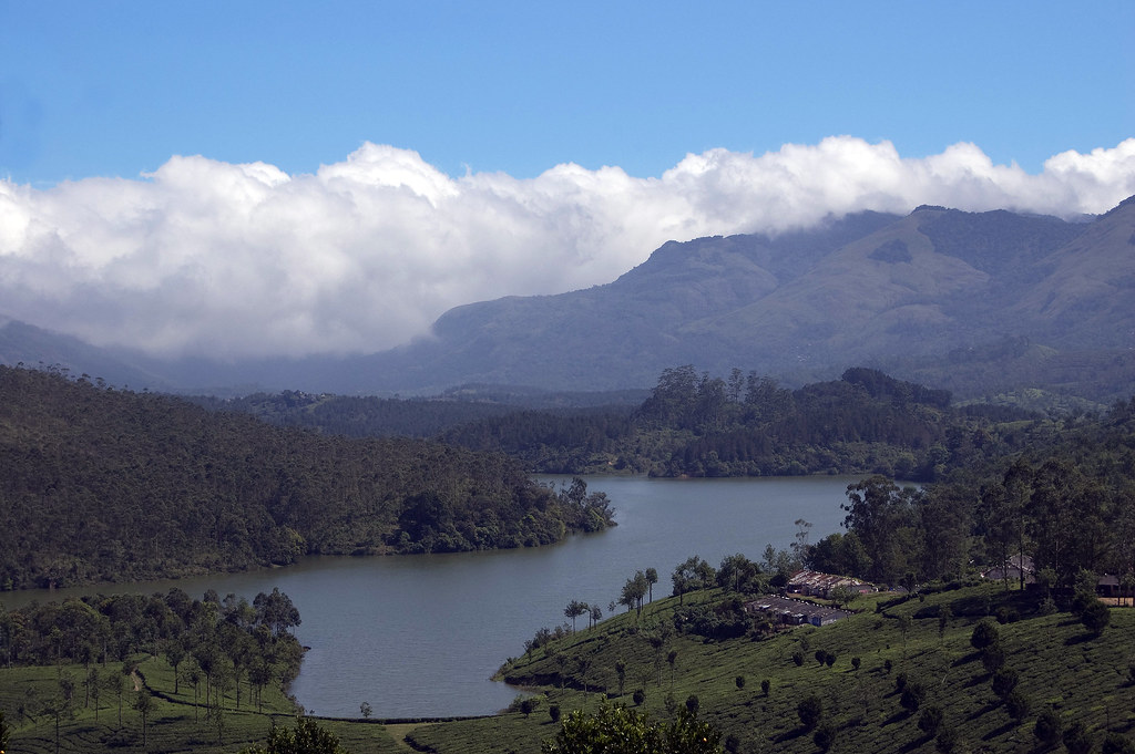 Mattupetty Lake surrounded by tea estates and Western Ghats peaks, Munnar