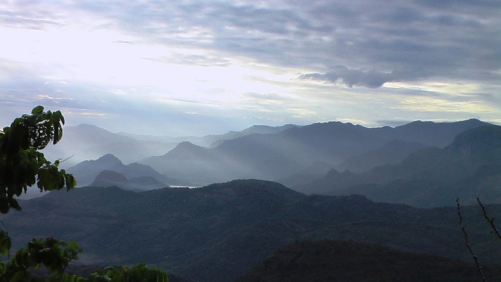 Layered mountain ridges at dawn from Top Station viewpoint, Munnar