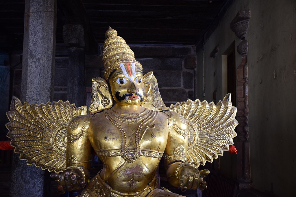 Golden Garuda statue inside a Mysore temple