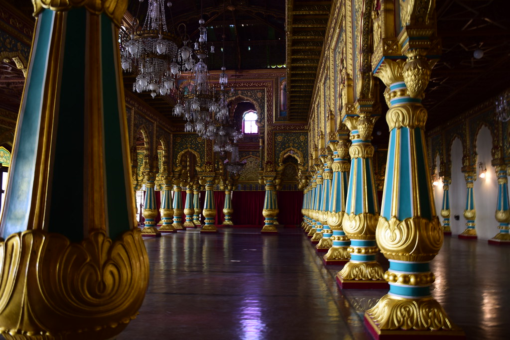 Mysore Palace Durbar Hall — ornate golden columns and crystal chandeliers